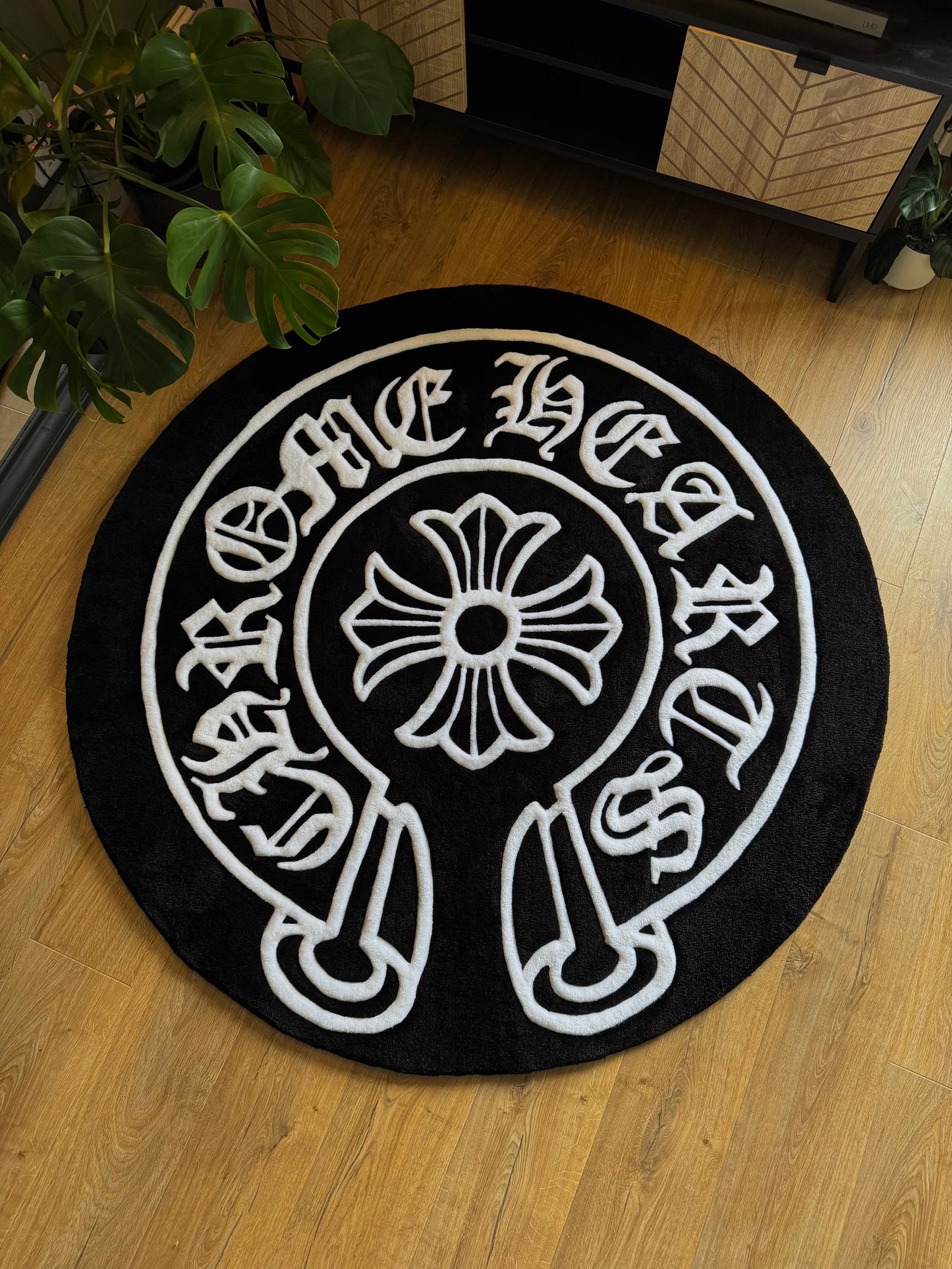 Chrome Hearts-inspired tufted rug featuring bold gothic cross design — a statement collectible for streetwear enthusiasts and luxury interiors