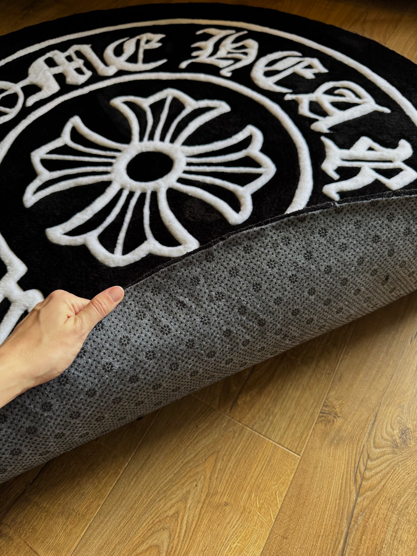 Chrome Hearts-inspired tufted rug featuring bold gothic cross design — a statement collectible for streetwear enthusiasts and luxury interiors