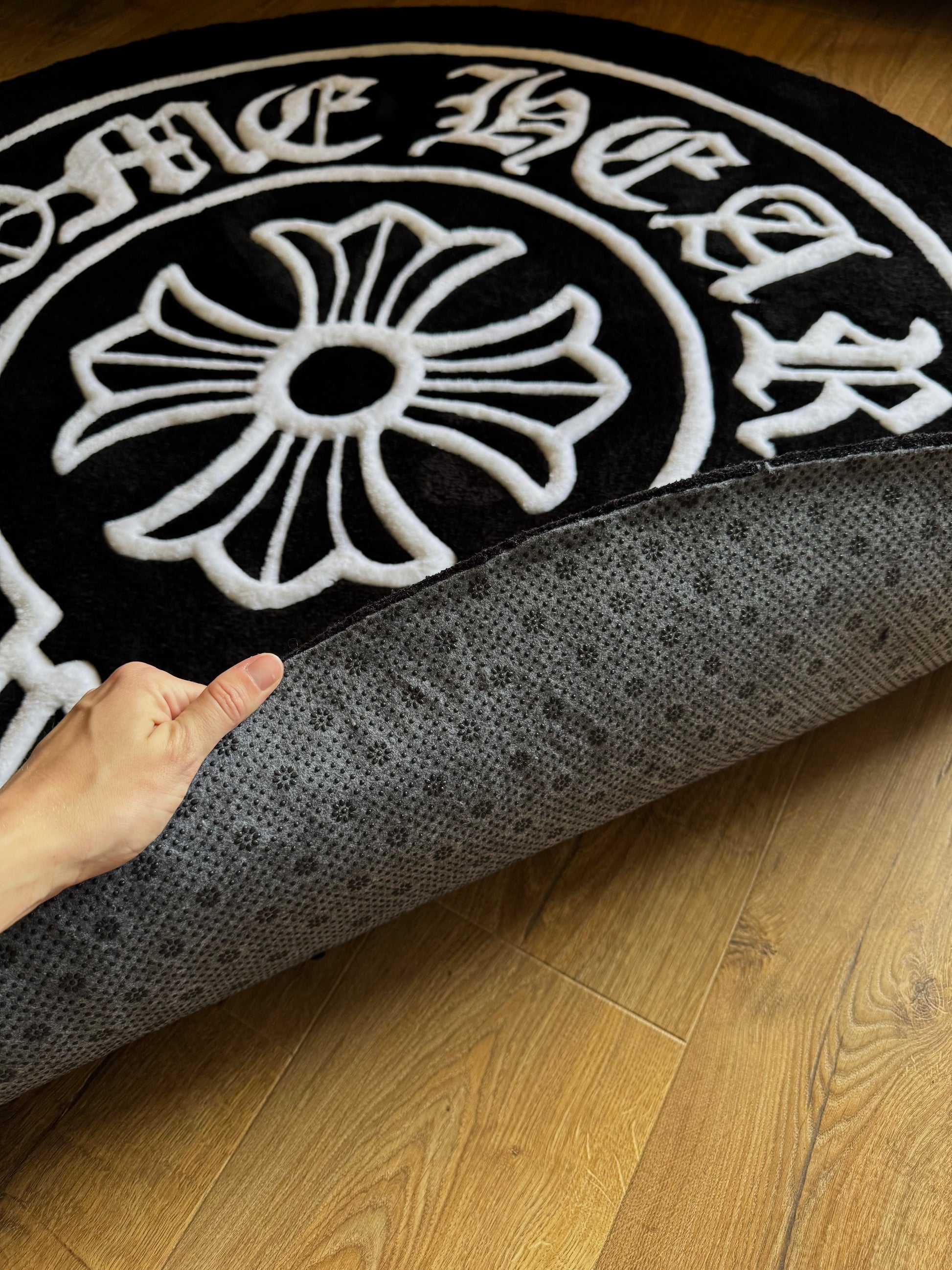 Chrome Hearts-inspired tufted rug featuring bold gothic cross design — a statement collectible for streetwear enthusiasts and luxury interiors